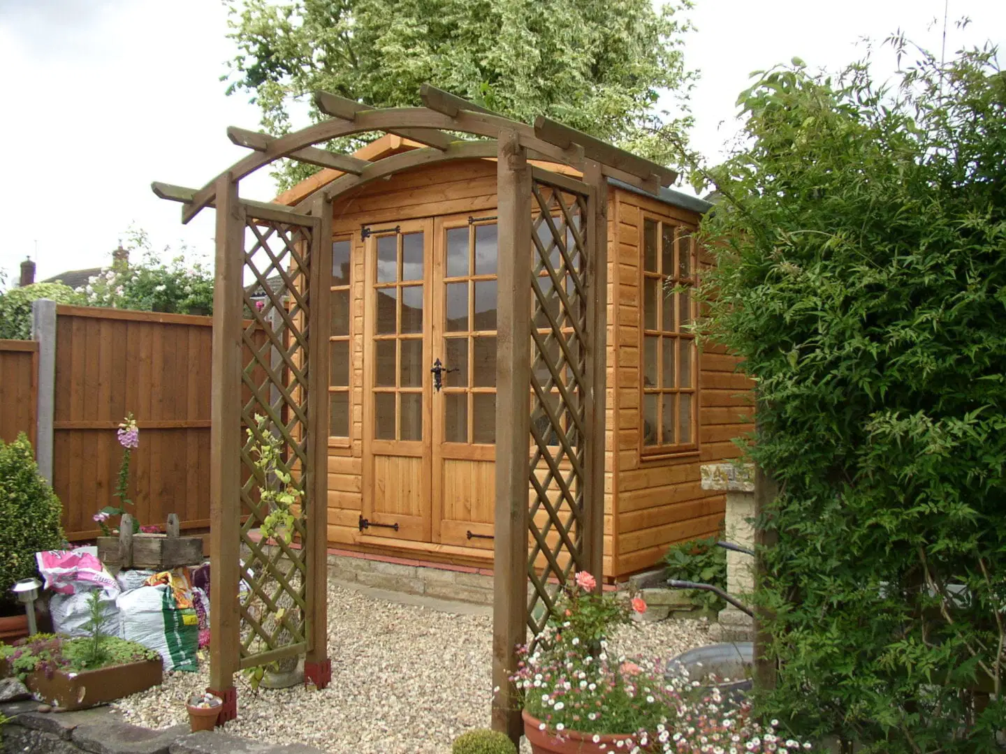 8x6 timber summer house with glazed doors by Master Sheds