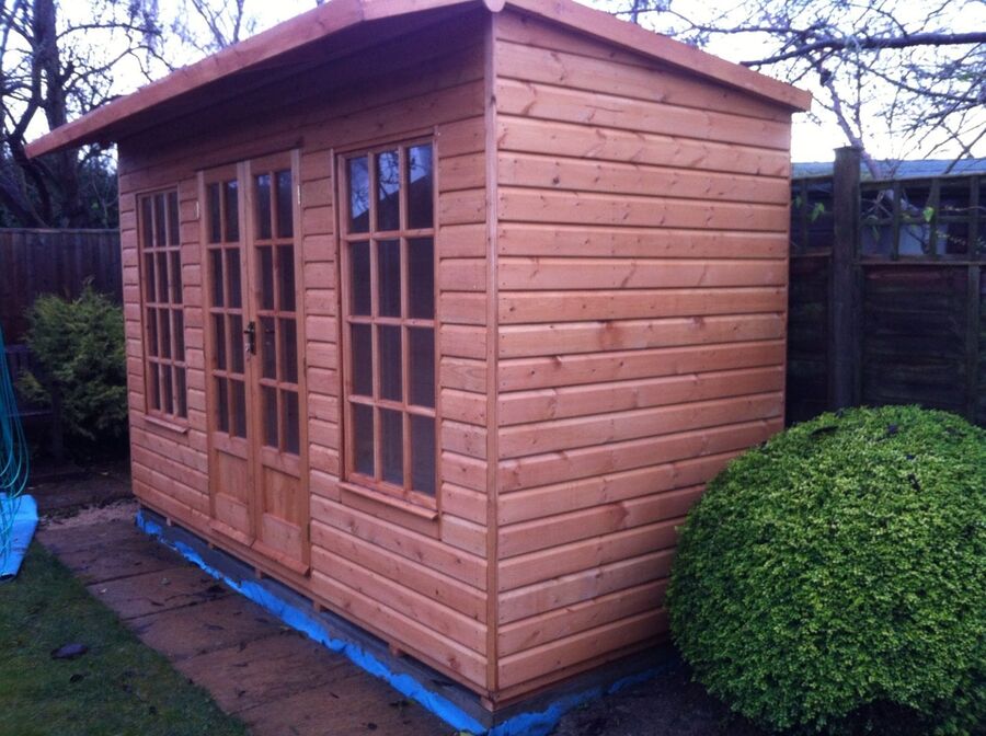 Timber summer house built by Master Sheds
