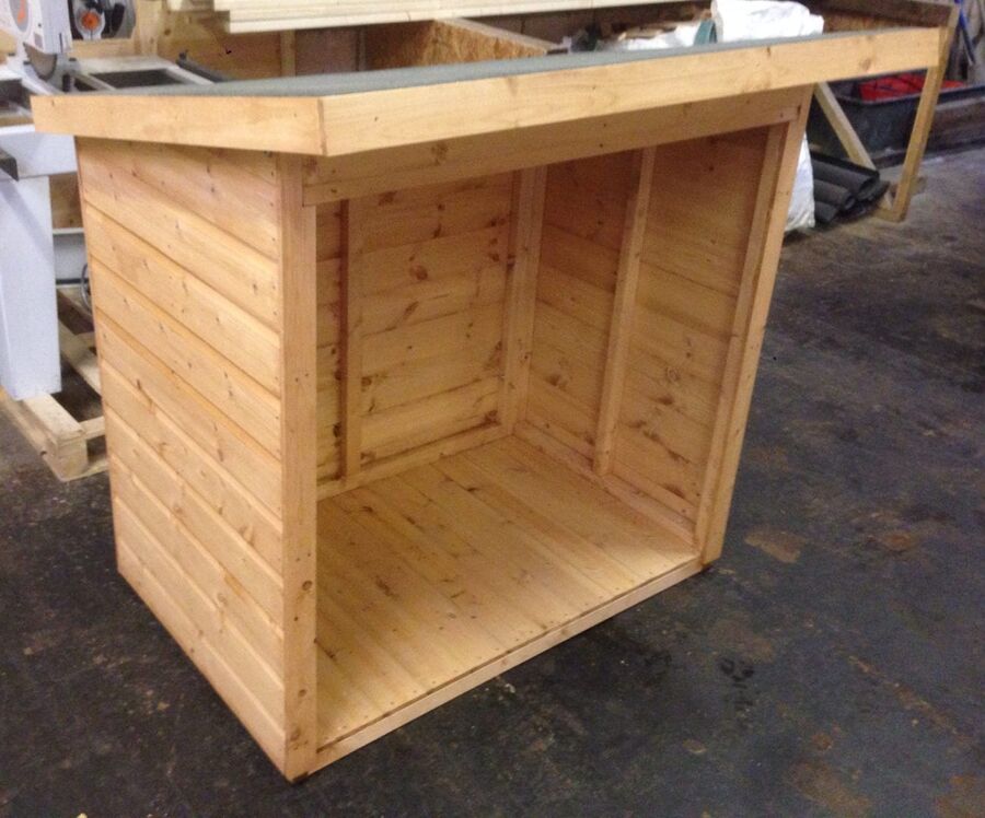 Small open-fronted timber store
